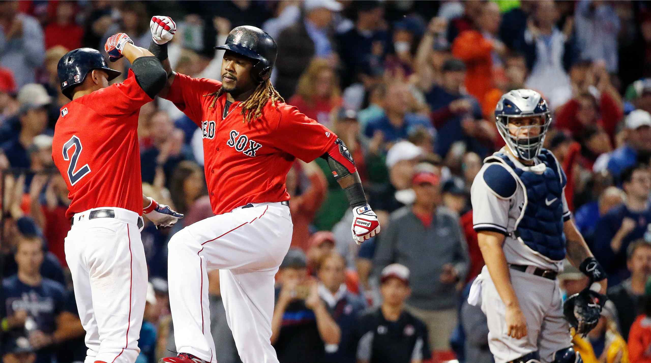 Former Boston Red Sox player Hanley Ramírez celebrating against the New York Yankees.
